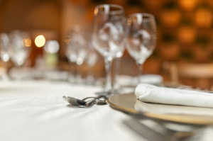 Elegant table setting with wine glasses.