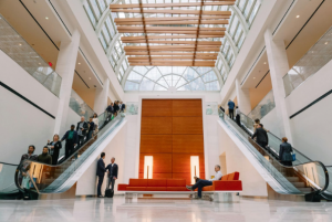 A mall lobby with escalators.