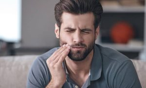 Why Does My Tooth Hurt When I Lay Down? What It Means 2026