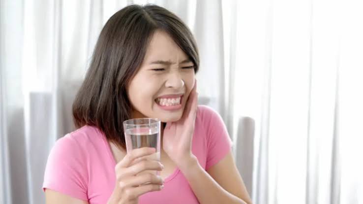 Why Does My Tooth Hurt When I Drink Something Cold? Causes 2026