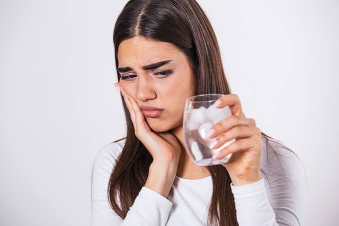 Why Does My Tooth Hurt When I Drink Something Cold? Causes 2026