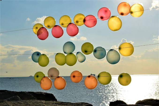 Why Do Balloons Pop When They Touch Grass? Explained 2026