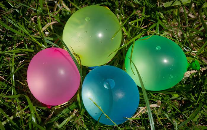 Why Do Balloons Pop When They Touch Grass? Explained 2026
